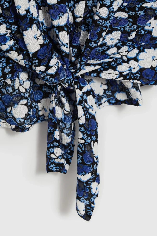 Koszula w kwiaty z wiązaniem niebieska