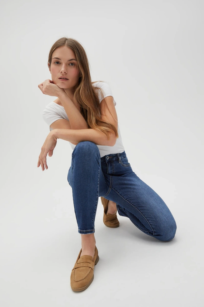 Jeansy skinny ze średnim stanem niebieskie