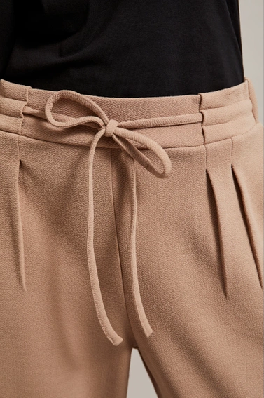 Spodnie z wiązaniem beżowe