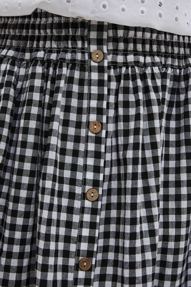 Rozkloszowana spódnica w kratę