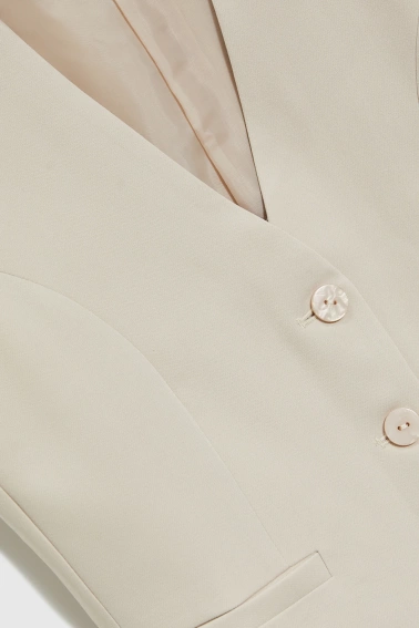 Elegancka kamizelka beżowa