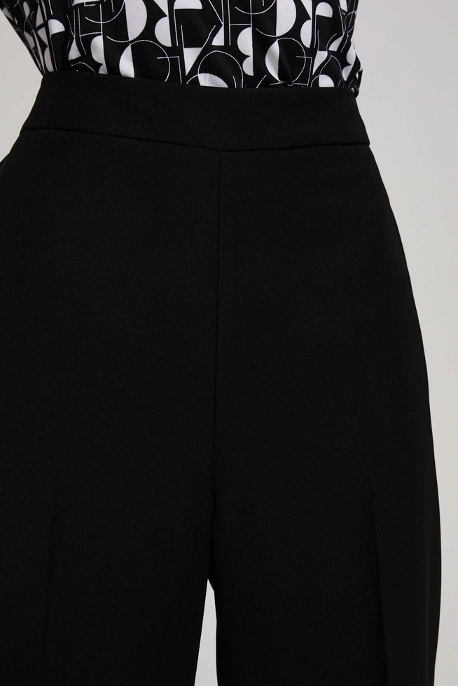 Gładkie spodnie z szerokimi nogawkami