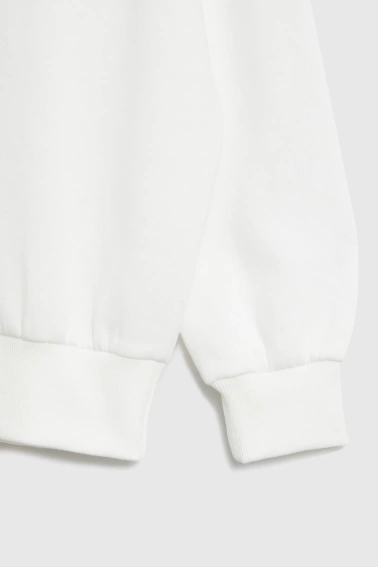 Bluza z haftowanym kwiatem biała