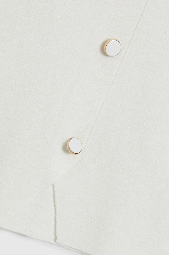 Dopasowany top z ozdobnymi guzikami beżowy