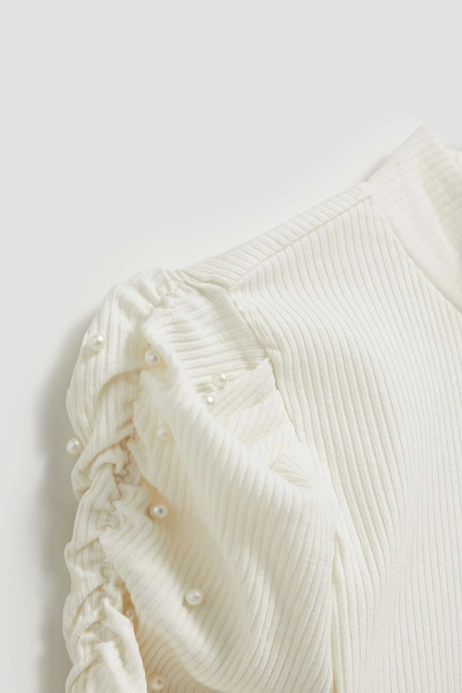 Bluzka z bufiastymi rękawami perłowa