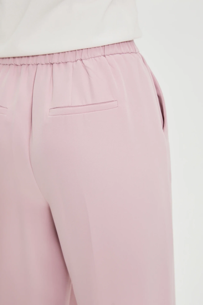 Spodnie z kantem różowe