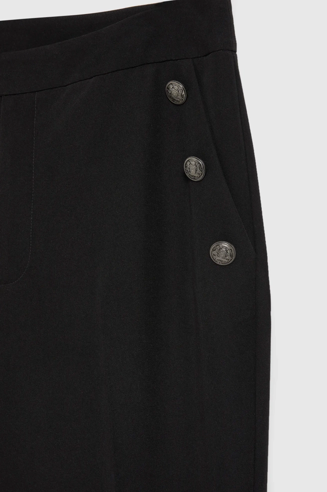 Spodnie z ozdobnymi guzikami na kieszeniach czarne