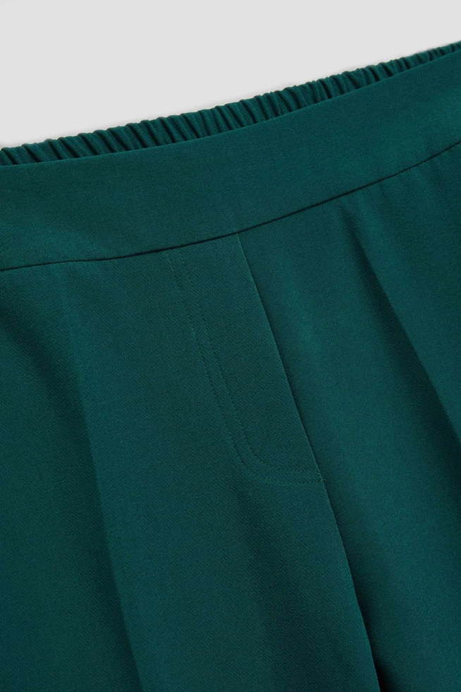 Spodnie w kant z nogawką 7/8 szmaragdowe