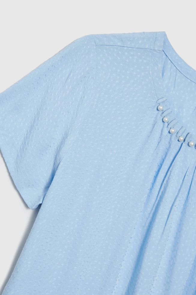 Koszula z ozdobnym dekoltem błękitna