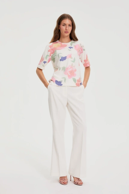 Spodnie z szerokimi nogawkami w kant białe