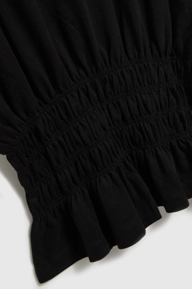 Bluzka z gumą w talii czarna