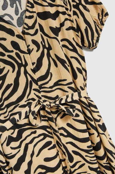 Wzorzysta sukienka maxi beżowa