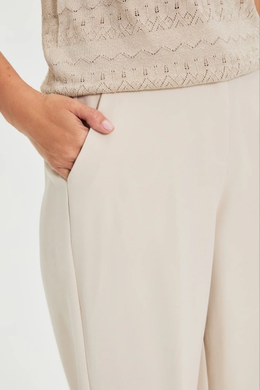 Spodnie z kantem beżowe