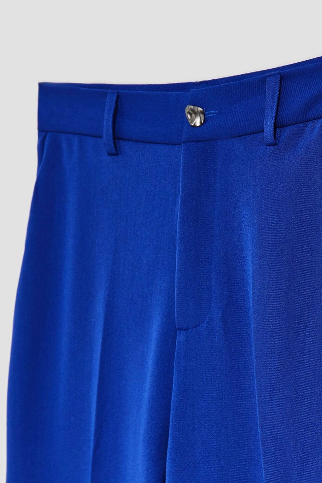 Spodnie w kant z szerokimi nogawkami niebieskie