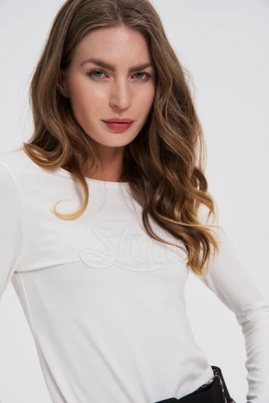 Bluzka z cekinami biała