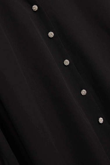 Koszula z ozdobnymi guzikami i bufiastymi rękawami czarna