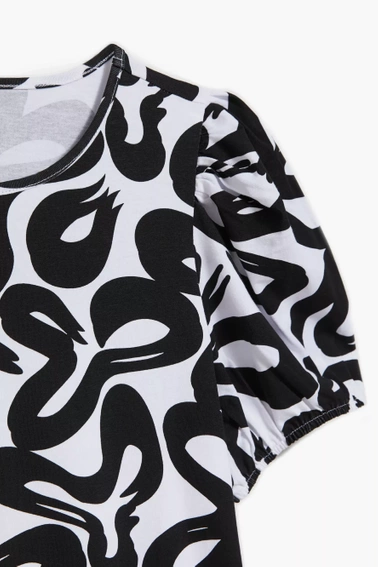 Bluzka z geometrycznym wzorem i bufiastymi rękawami czarno-biała