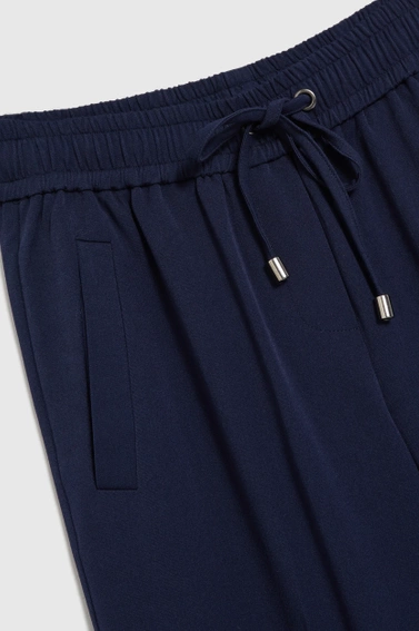 Spodnie z szerokimi nogawkami i wiązaniem w pasie granatowe