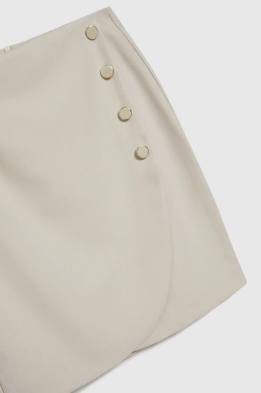 Spódnica z ozdobnymi guzikami beżowa