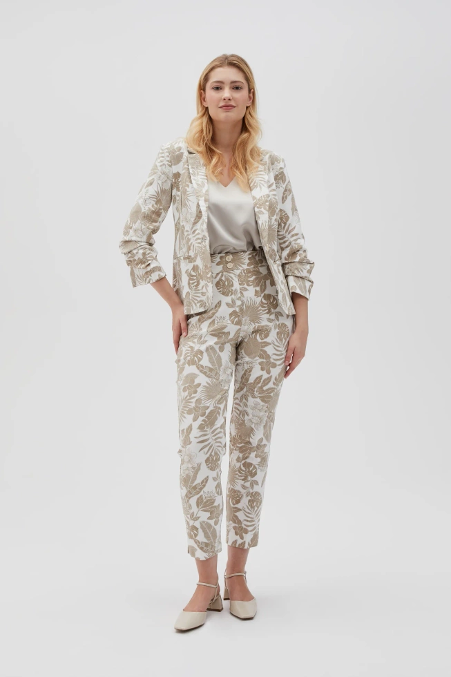 Spodnie z roślinnym wzorem beżowe
