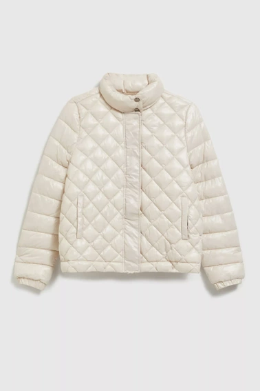 Krótka pikowna kurtka zapinana na zamek beżowa