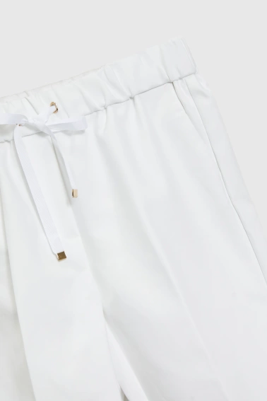 Spodnie z prostymi nogawkami w kant białe