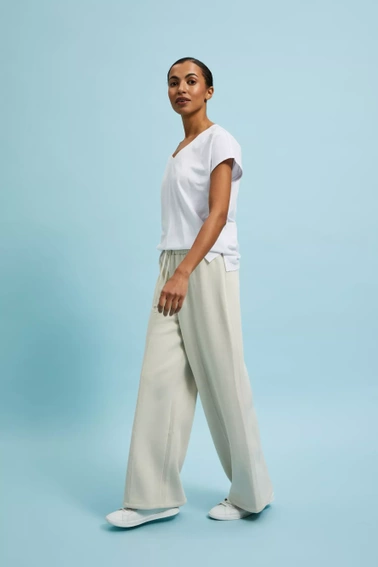 Spodnie dresowe z szerokimi nogawkami wiązane w talii beżowe