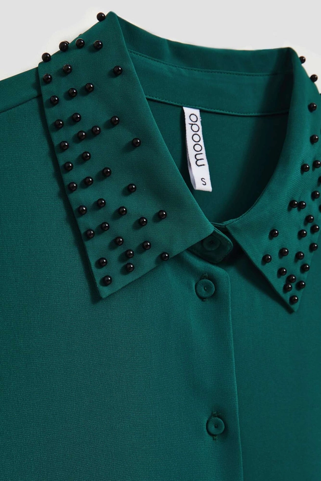 Koszula ozdobiona koralikami