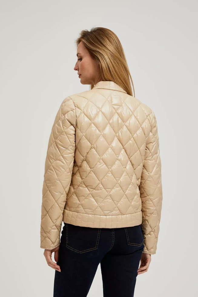 Krótka pikowna kurtka zapinana na napy beżowa