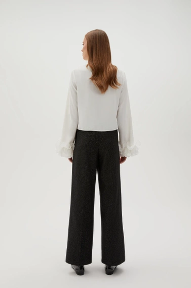 Spodnie ozdobione metaliczną nitką czarne