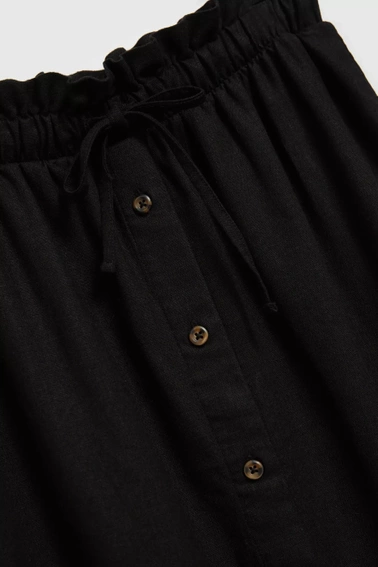 Spódnica zapinana na guziki z gumą w talii czarna