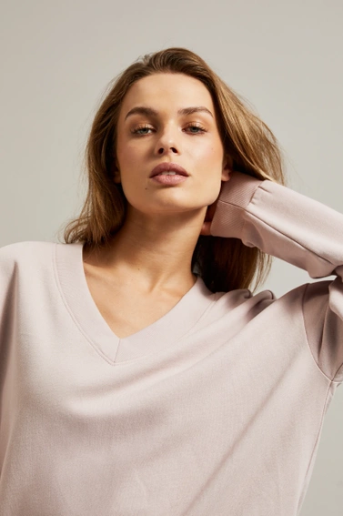 Bluza z dekoltem w serek i długimi rękawami różowa