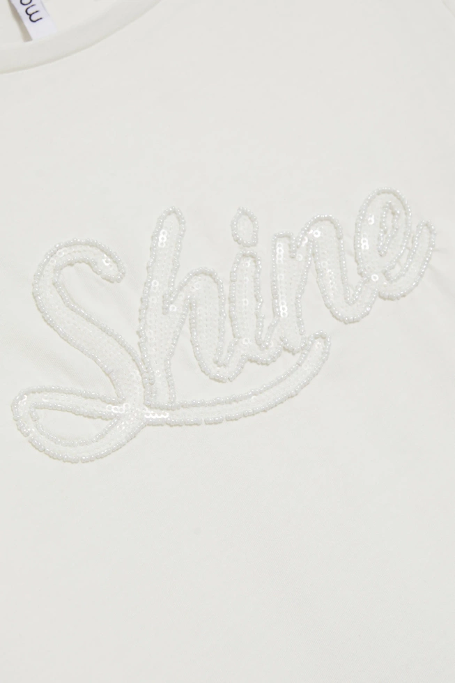 Bluzka z cekinami biała