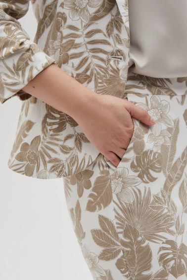 Spodnie z roślinnym wzorem beżowe