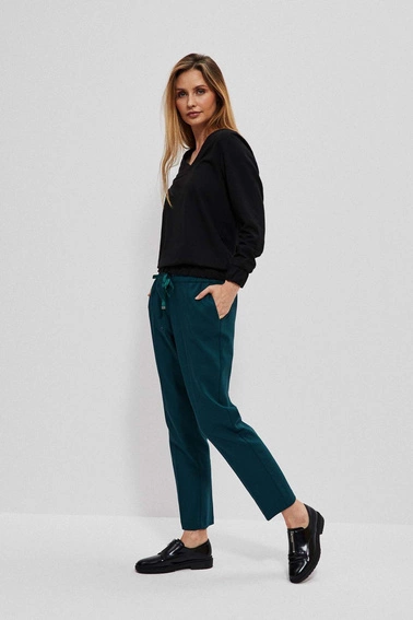 Spodnie z kantem szmaragdowe