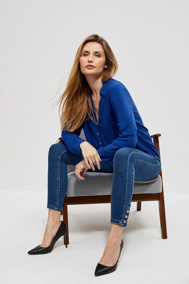 Jeansy rurki z ozdobnymi guzikami