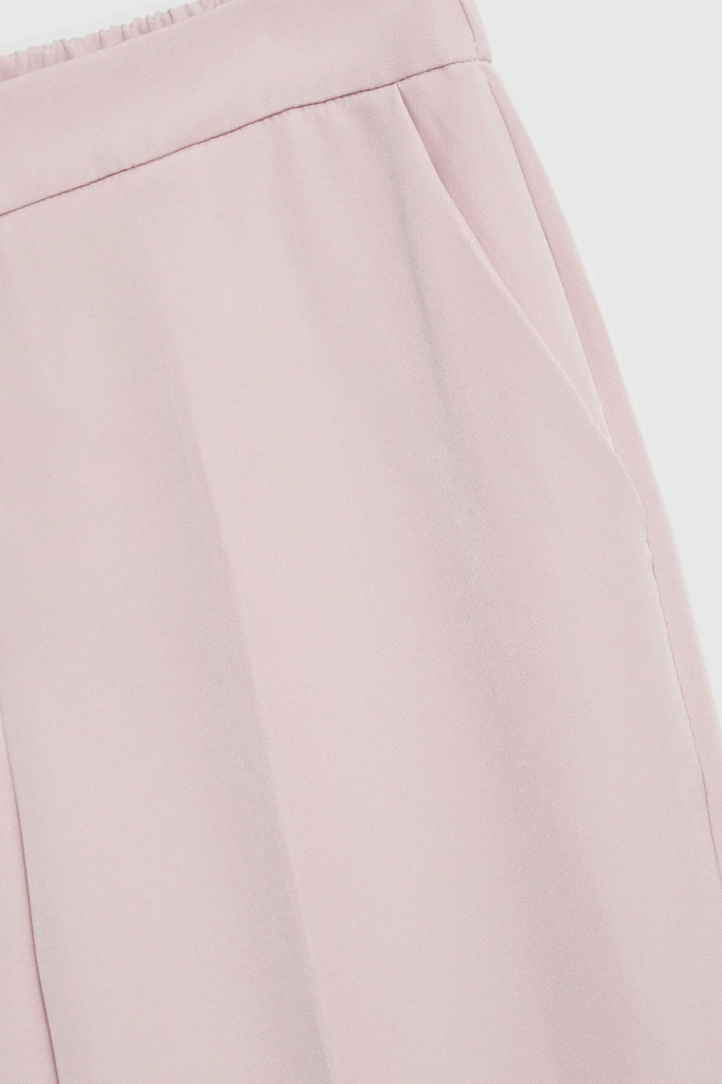Spodnie z kantem różowe