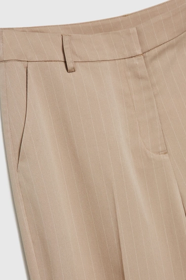 Spodnie z nogawkami w kant beżowe