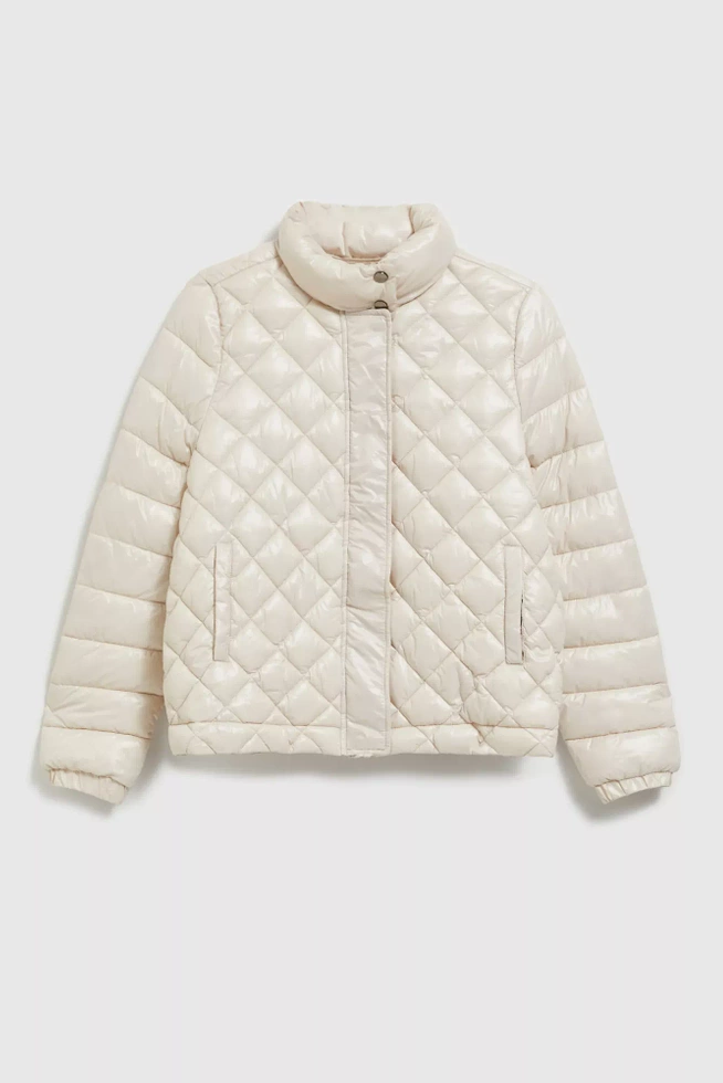 Krótka pikowna kurtka zapinana na zamek beżowa