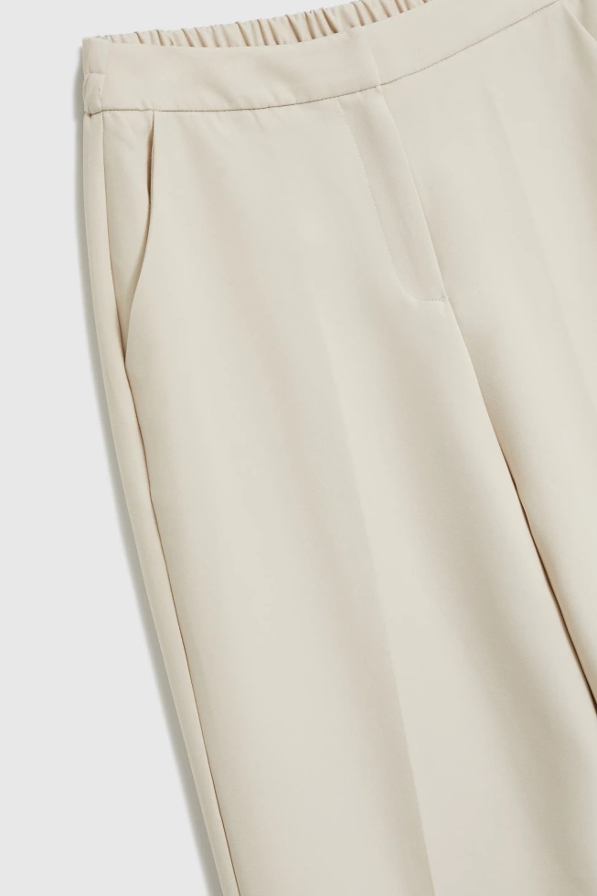 Spodnie z kantem beżowe