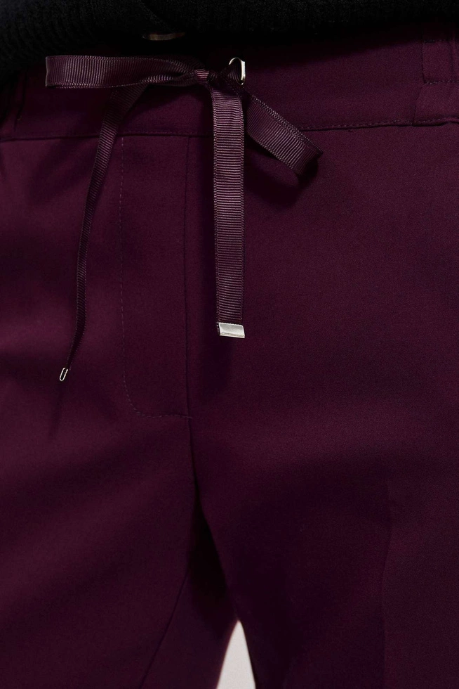 Spodnie z kantem koloru burgund
