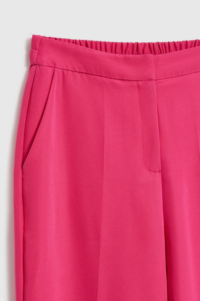 Spodnie z kantem różowe