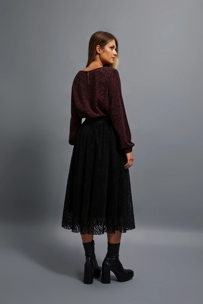 Rozkloszowana spódnica midi