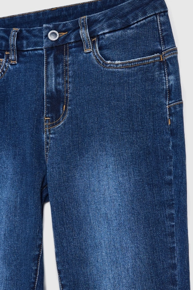 Jeansy skinny ze średnim stanem niebieskie