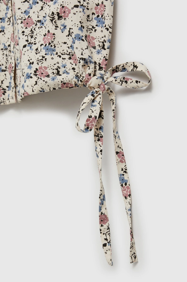 Koszula w kwiatki z kołnierzykiem i krótkimi rękawami beżowa