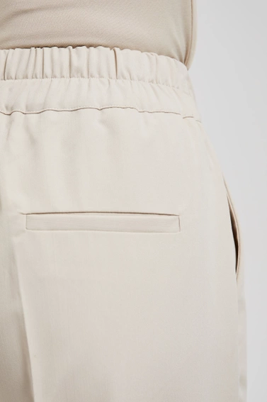 Gładkie spodnie cygaretki beżowe 