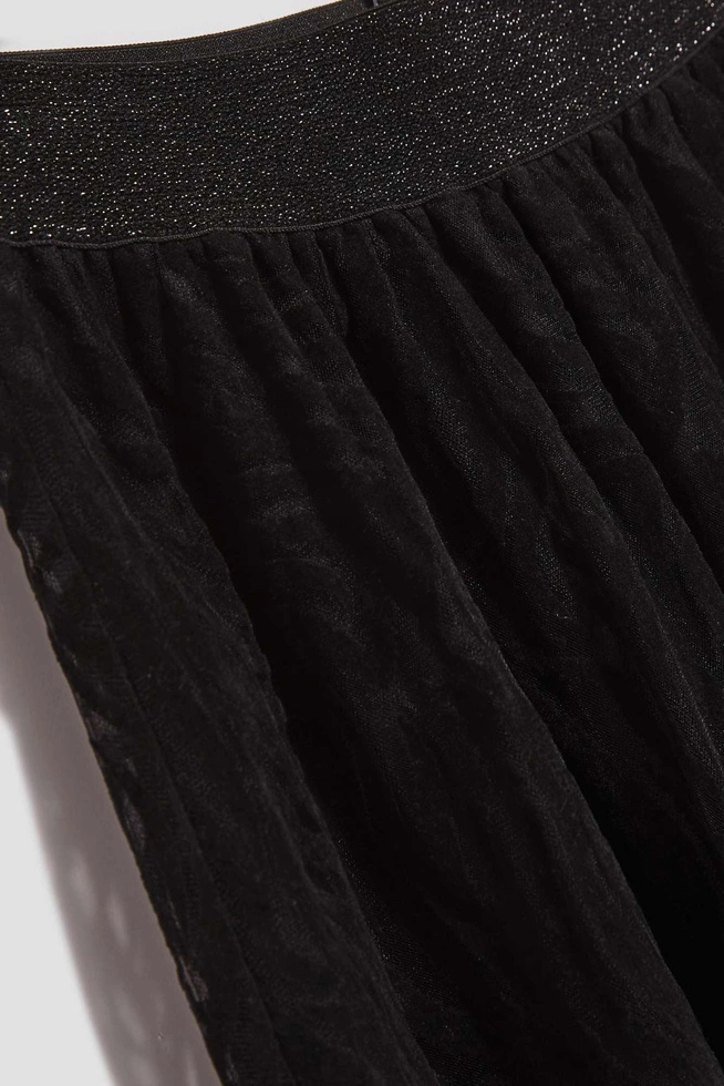 Rozkloszowana spódnica midi