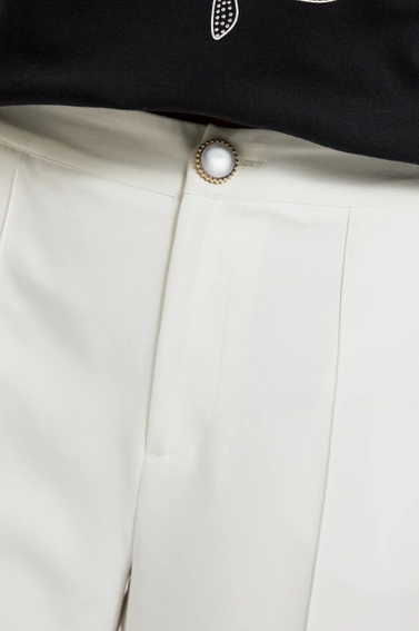 Eleganckie spodnie w kant białe