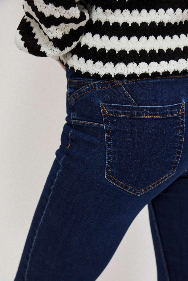 Jeansy skinny z guzikami granatowe