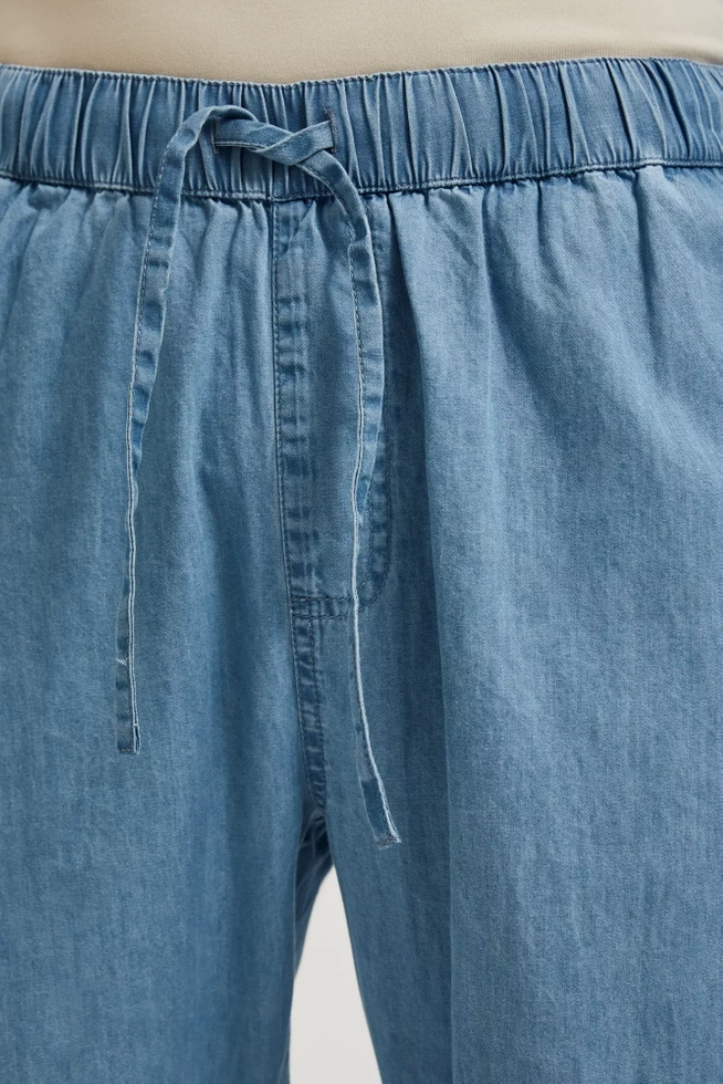 Jeansy z gumą w talii i nogawkach niebieskie